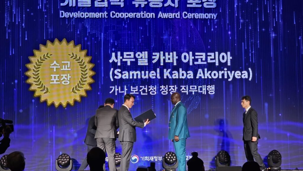 Dr Akoriyea(second right) receiving his award