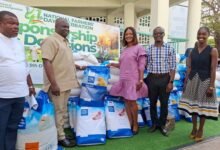 • Mr Opoku receiving the items from Ms Raji