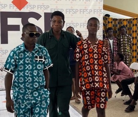 • Some of the students modelling on stage