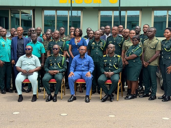 • Mr Affrifa (right), Mr Agbeti ( Second from right), Mr Andor (second from left) with some GIS staff after the engagement