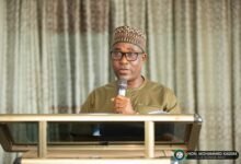 Alhaji Kassim (Inset) addressing headteachers at the workshop