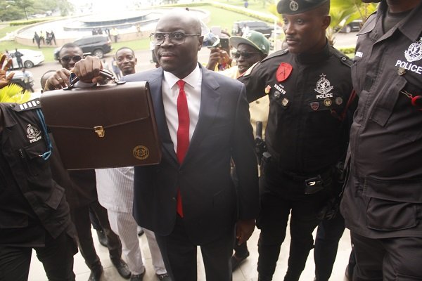 Dr Cassiel Ato Baah Forson showing a briefcase containing the budget documents. Photo. Ebo Gorman (8)