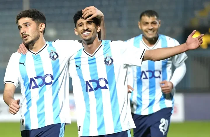 Hat-trick hero Ahmed Atef El Sayed (middle) leads the Pyramids celebrations