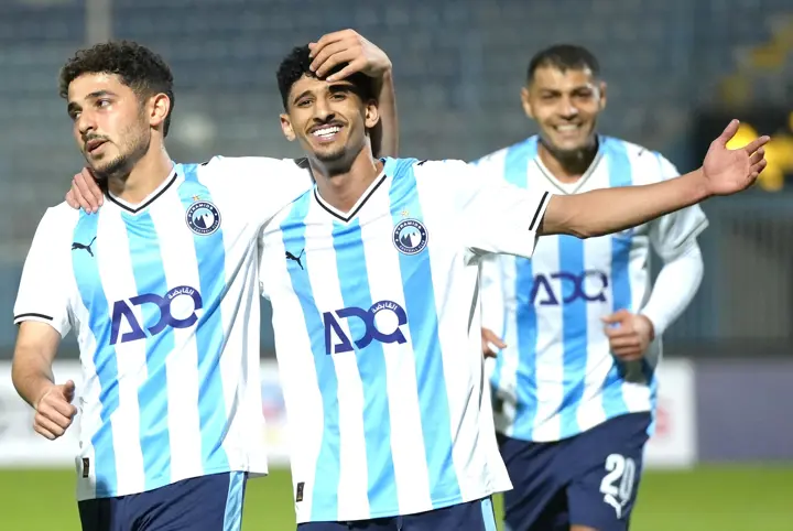 Hat-trick hero Ahmed Atef El Sayed (middle) leads the Pyramids celebrations