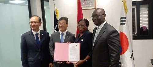 Dr. Forson (right) together with Mr Park Kyonsig(left) Dr Amoah (second from right)and and Mr Donghyun Lee at the signing ceremony.