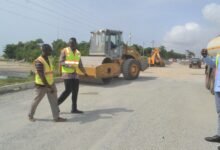 • Mr Anyetei (second from left) with Mr Rockson at the construction site Photo: Victor A. Buxton