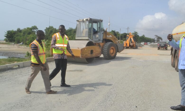 • Mr Anyetei (second from left) with Mr Rockson at the construction site Photo: Victor A. Buxton