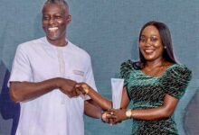 • Sandra receiving her award