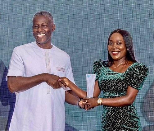 • Sandra receiving her award