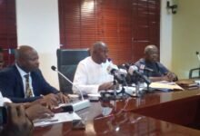 • Mr Dauda (middle) speaking at the press conference