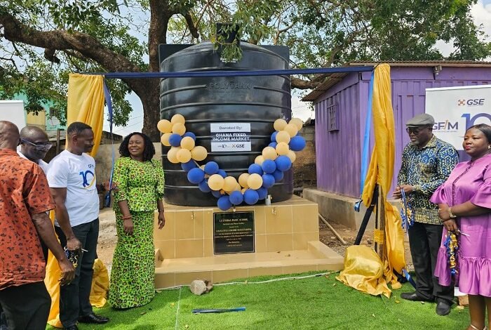 • Mr Berle (second from left) with Ms Sowah (third from left) and other dignitaries after handing over the project