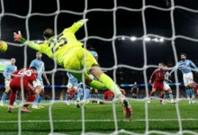 Liverpool went on to lose 3-0 after Andrew Robertson was penalised for ducking under Virgil van Dijk's header