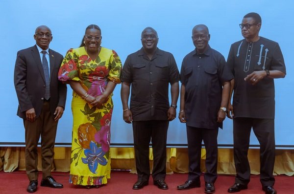 • Mr Julius Debrah (middle) with other government officials