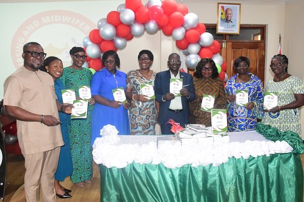 • Dr Hafiz Adam (fourth from right) with other stakeholders launching the policy Photo: Seth Osabukle