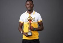 • Mr Patrick Martey Boye with the winners’ trophy