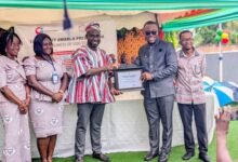 • Mr Prince Frimpong Kumi (middle) receiving the award from a representative from EduQuality