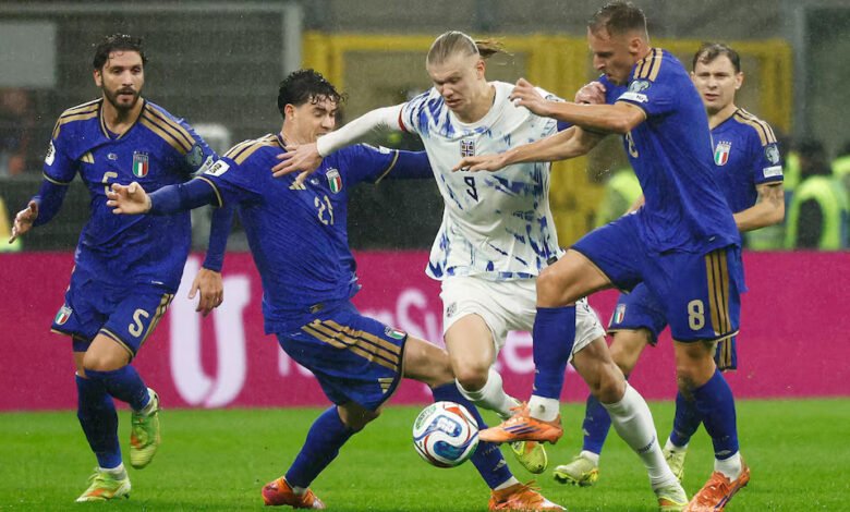 Norway's Erling Haaland in action with Italy's Davide Frattesi and Alessandro Bastoni