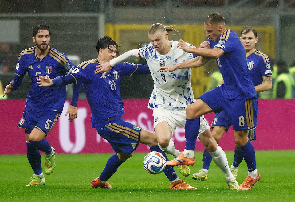 Norway's Erling Haaland in action with Italy's Davide Frattesi and Alessandro Bastoni