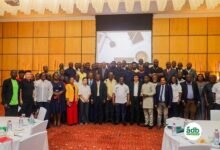 Officials of the Bank with customers who took part in the event