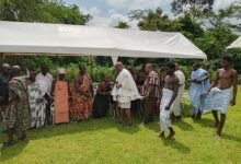• Okotwareasou Agyekum III (in white) exchanging pleasantries with council members