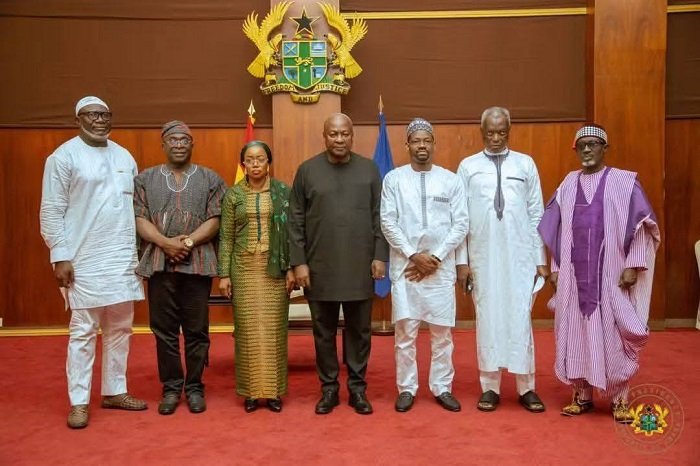 • President John Mahama (middle) with the Hajj Board members after the inauguration