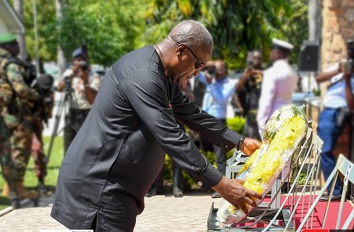• President Mahama laying a wreath on behalf of the Government and people of Ghana