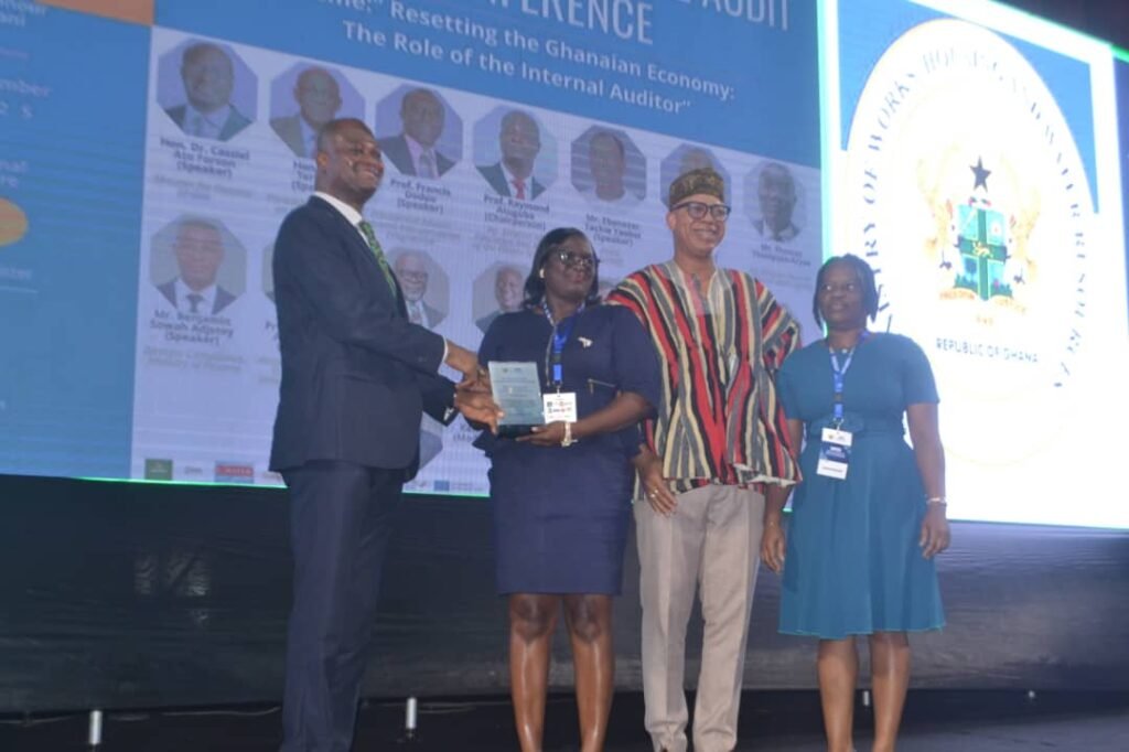 Prof Raymond A. Atuguba (left) presenting an award to some of the winners during the programme Photo Victor A. Buxton