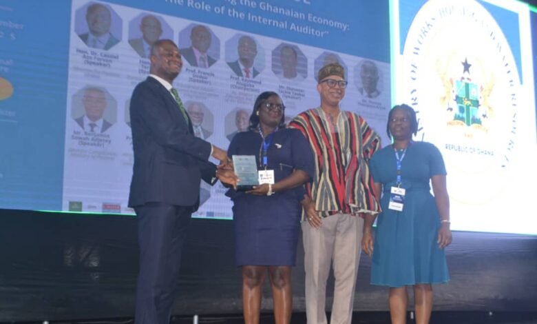 Prof Raymond A. Atuguba (left) presenting an award to some of the winners during the programme Photo Victor A. Buxton