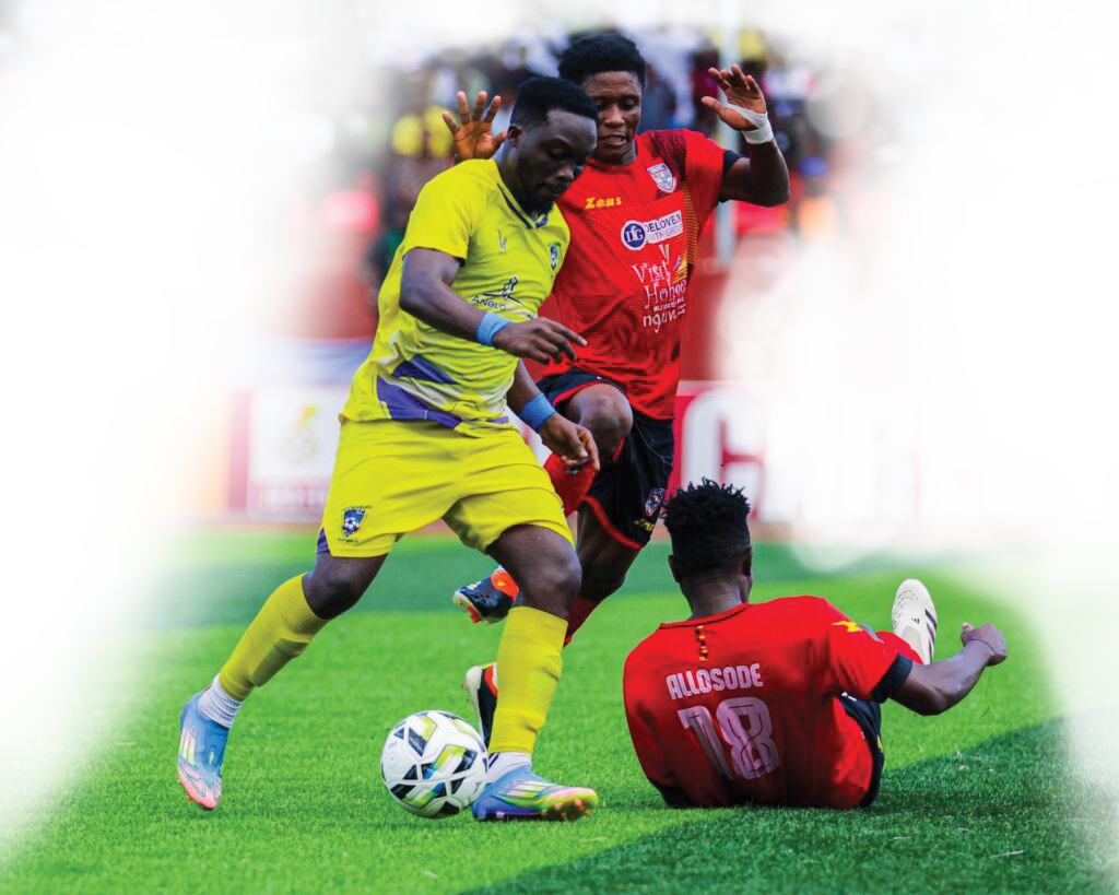 • Salim of Medeama controls the ball away from the Hohoe United markers