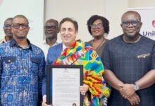 Ambassador Kheir (middle) with board and management staff of UniMAC