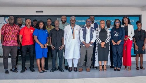 • Mr Atweam (third from right) with some executives of WHO and journalists after the training