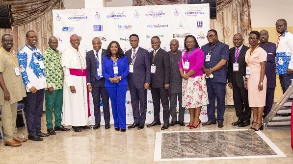 • Mr Akandoh (middle) with executives of CHAG