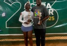 Abena Henodzi and Alex Kumah with their trophies after winning the mixed doubles event
