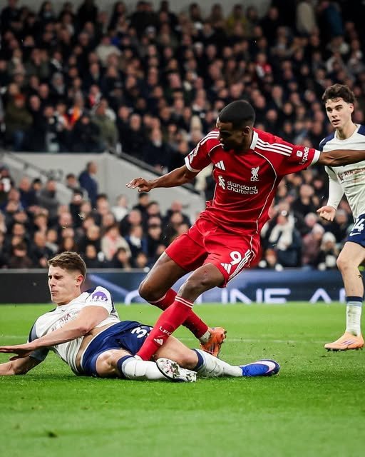 Alexander Isak comes under a challenge from Van de Ven