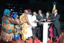 • Mr Terkper (fourth from right) being assisted by Elder Ojediran and other dignitaries to switch on the Christmas light to mark the programme