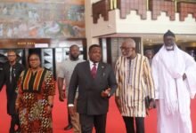 • Mr Samuel George (second from left) in a discussion with Prof. Nii Narku Quaynor (second from right) after the forum