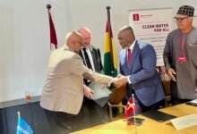 • Mr Osama Makkawi Khogali (left) exchanging pleasantries with Mr Kenneth Gilbert Adjei and other partners