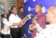 • Dr Alhassan addressing the media