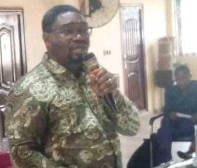 Ebenezer Baiden (inset) speaking at the forum in Aflao