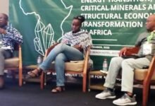 Dr Graham with other speakers at the programme