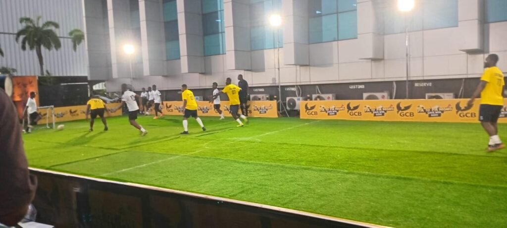 • The GCB Bank PLC team in a football match with GAD F.C, during the launch of the 'PA to PA' promo • Ahunabobrim Nana Prah Agyensaim VI (inset) addressing the graduands • Ms Patricia Blankson (inset) speaking at the programme Photo: Victor A. Buxton