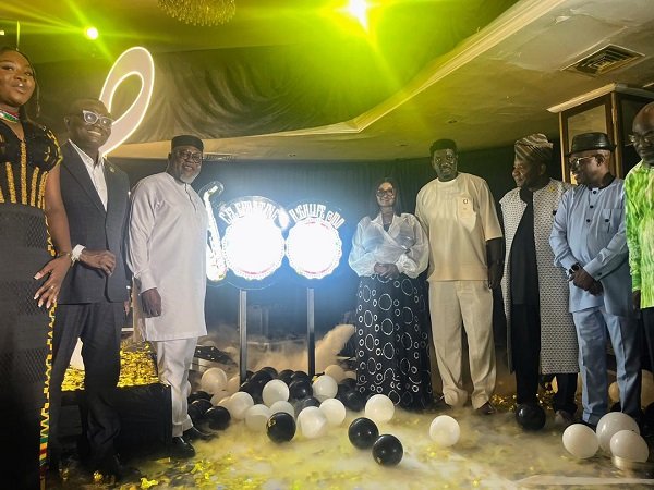 Maame Efua Houadjeto (fifth from right) with other dignitaries unveiling the anniversary logo
