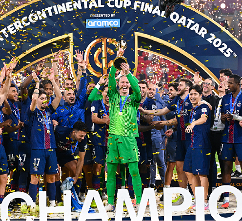 Goalkeeper Matvey Safonov celebrates with the trophy and his teammates