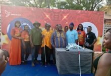 • Mr Dennis Adutwum(third from right),Dr Peter Obeng-Asamoa(fourth from right) with the luckiest team at the event