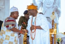 • President Mahama (left) exchanging greetings with His Majesty Oba Adeyeye Enitan Ogunwusi