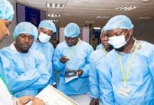 Journalists being taken through printing processes at Margins