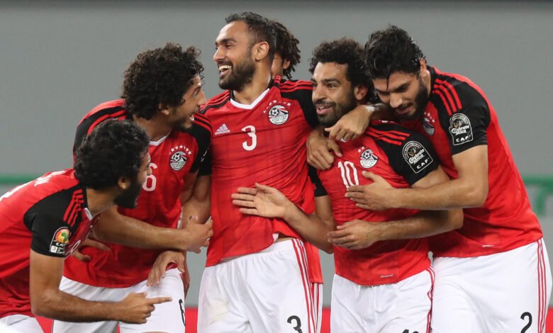 Mohamed Salah celebrates a goal with his teammates