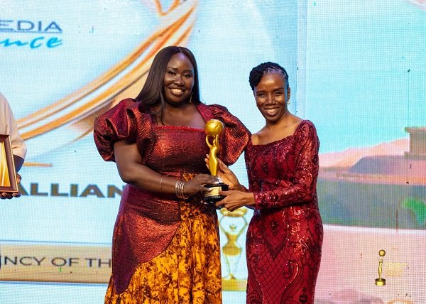 • Ms Wenani (left) receiving her award