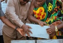 • President Mahama being assisted by Togbui Afede XIV to lay the foundation block