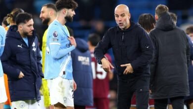 Pep Guardiola speaks to Josko Gvardiol on the pitch after the game